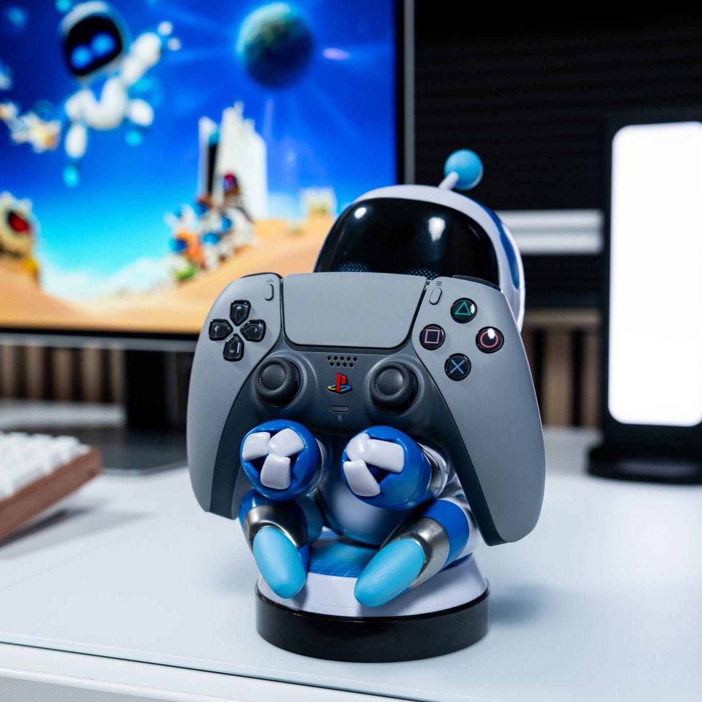 Astro Bot Controller & Phone Holder holding a playstation controller 