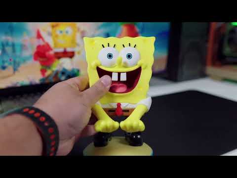 A Cable Guy figure of SpongeBob SquarePants standing upright with arms extended to hold a controller or device.