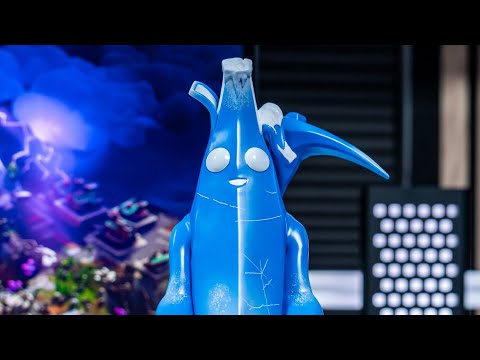 An XL Cable Guy figure of Polar Peely from Fortnite standing upright and holding its arms out to support a device.
